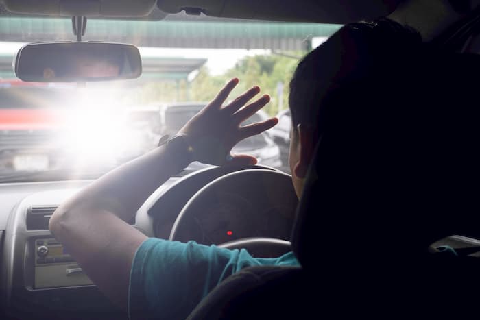 BRIGHT, BLINDING HEADLIGHTS HOW TO AVOID BEING BLINDED BY ONCOMING HIGH BEAMS